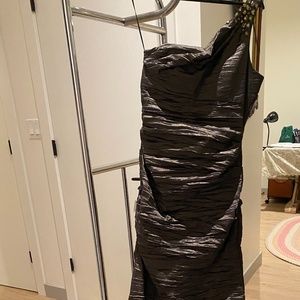 Green "off the shoulder" Crimp dress to the floor.